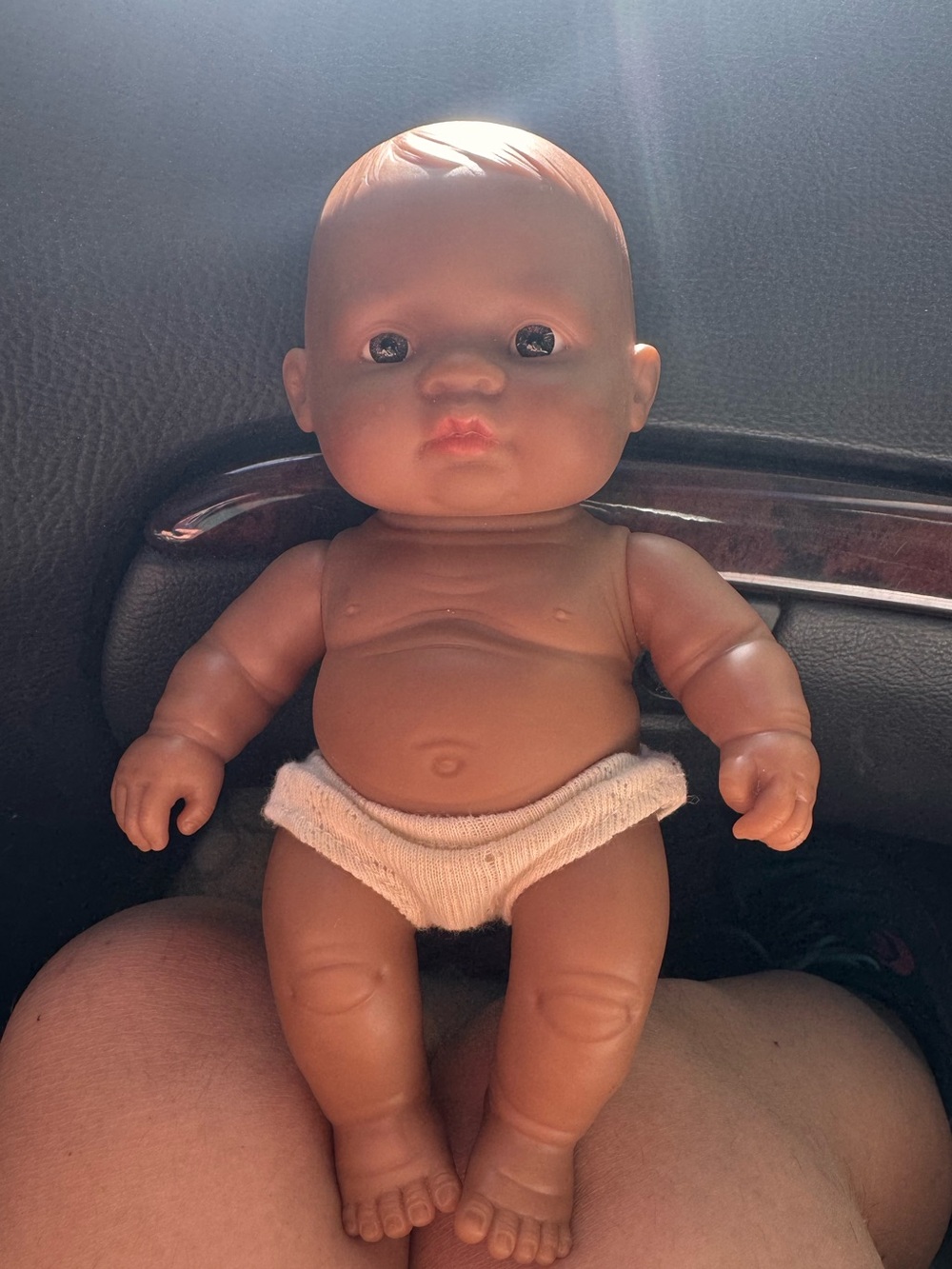 M Miniland anatomically correct doll, known for its realistic features